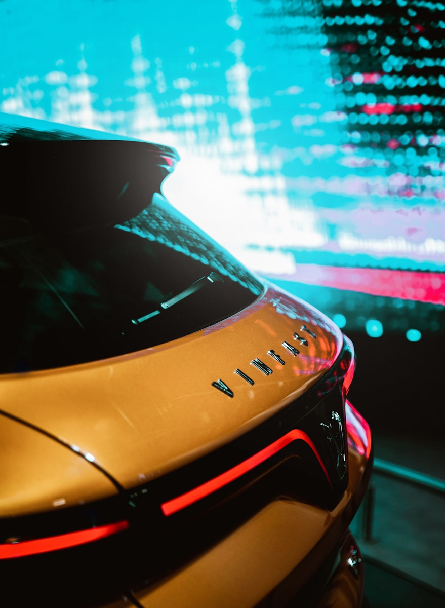 a yellow car parked in front of a building